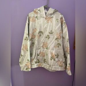 Winter Green and Brown Leaf Hoodie With Snow